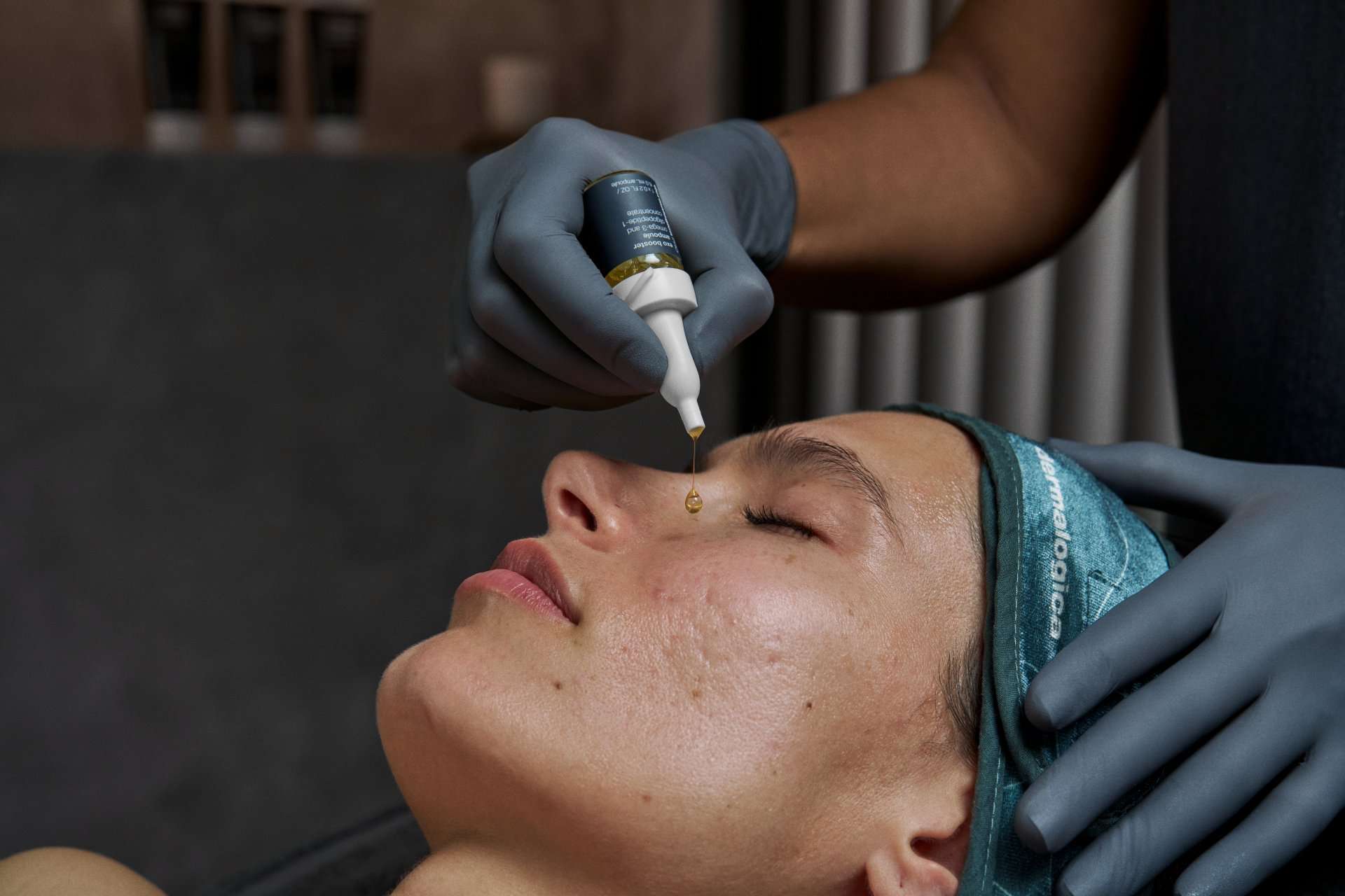 application of dermalogica exosome treatment exobooster in professional microneedling treatment